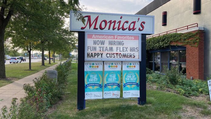 Monicas hiring sign