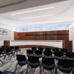 A new North Liberty City Hall would council chambers with TVs on the side walls and an entrance at the back of the room.