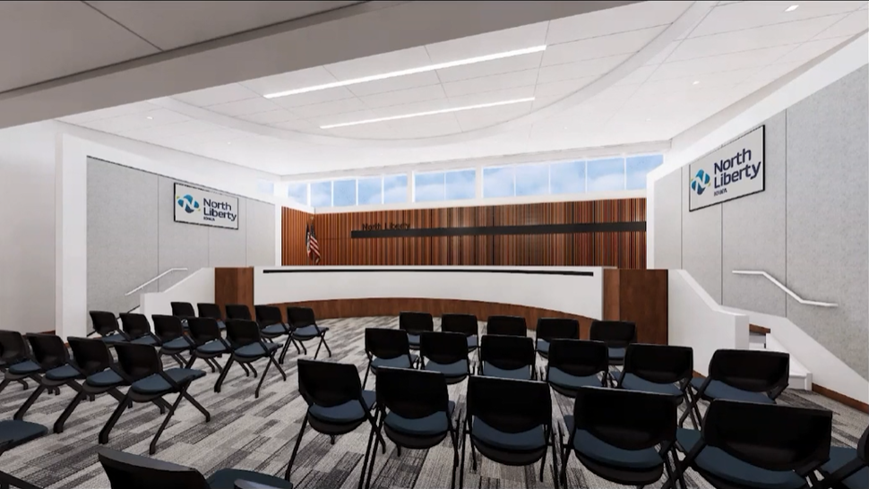 A new North Liberty City Hall would council chambers with TVs on the side walls and an entrance at the back of the room.