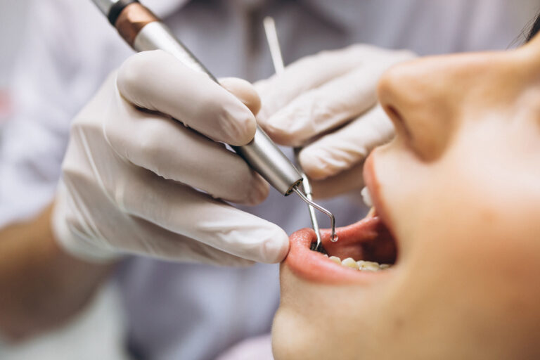 Woman patient at dentist benefits