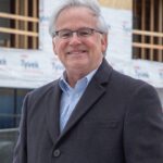 Mark Kittrell, of Eagle View Partners, stands in front of the second phase of the Broad and Main development in Marion.