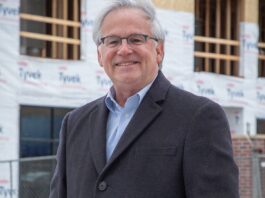 Mark Kittrell, of Eagle View Partners, stands in front of the second phase of the Broad and Main development in Marion.