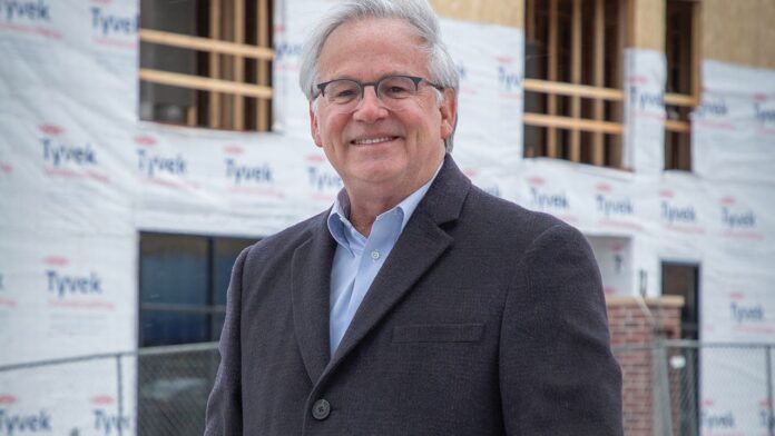 Mark Kittrell, of Eagle View Partners, stands in front of the second phase of the Broad and Main development in Marion.