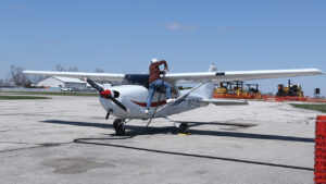 A pilot re-fuels his plane at the Marion Airport. CREDIT RICHARD PRATT