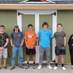 Students pictured left to right: Zander Edkin, Ryan Humphrey, Carter Hebl, Ty Becicka, Charlie Crigger, Kale Clark, and Kassidy Harrison. CREDIT GREATER IOWA CITY AREA HOME BUILDERS ASSOCIATION