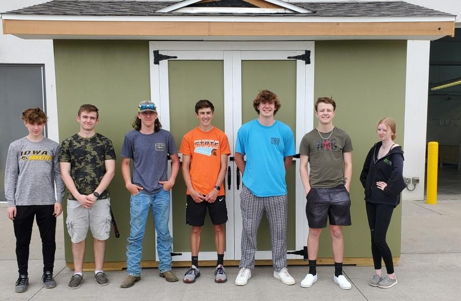 Students pictured left to right: Zander Edkin, Ryan Humphrey, Carter Hebl, Ty Becicka, Charlie Crigger, Kale Clark, and Kassidy Harrison. CREDIT GREATER IOWA CITY AREA HOME BUILDERS ASSOCIATION
