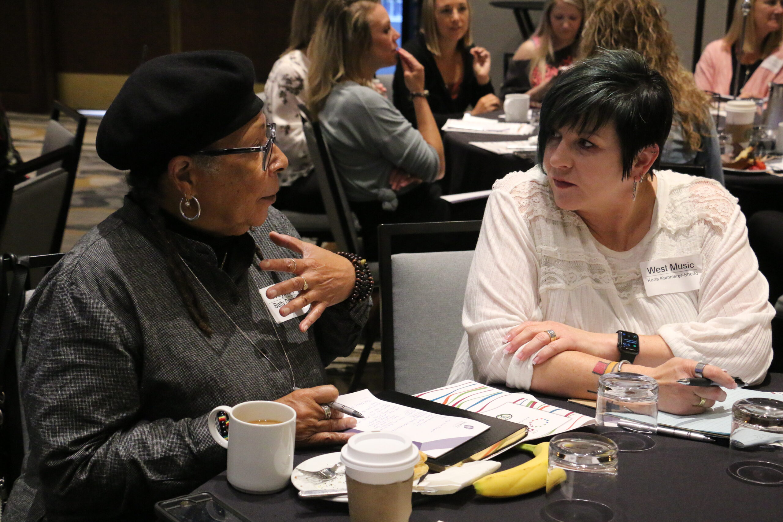 Attendees discuss a prompt at CBJ's Diversity , Inclusion & Impact Symposium on Aug. 17, 2022.