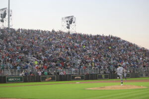 A capacity crowd of 8,000 enjoys the first minor league game ever played at the iconic "Field of Dreams" movie site in Dyersville, Iowa.