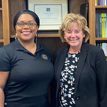 Traci Silas and UI President Barbara Wilson.