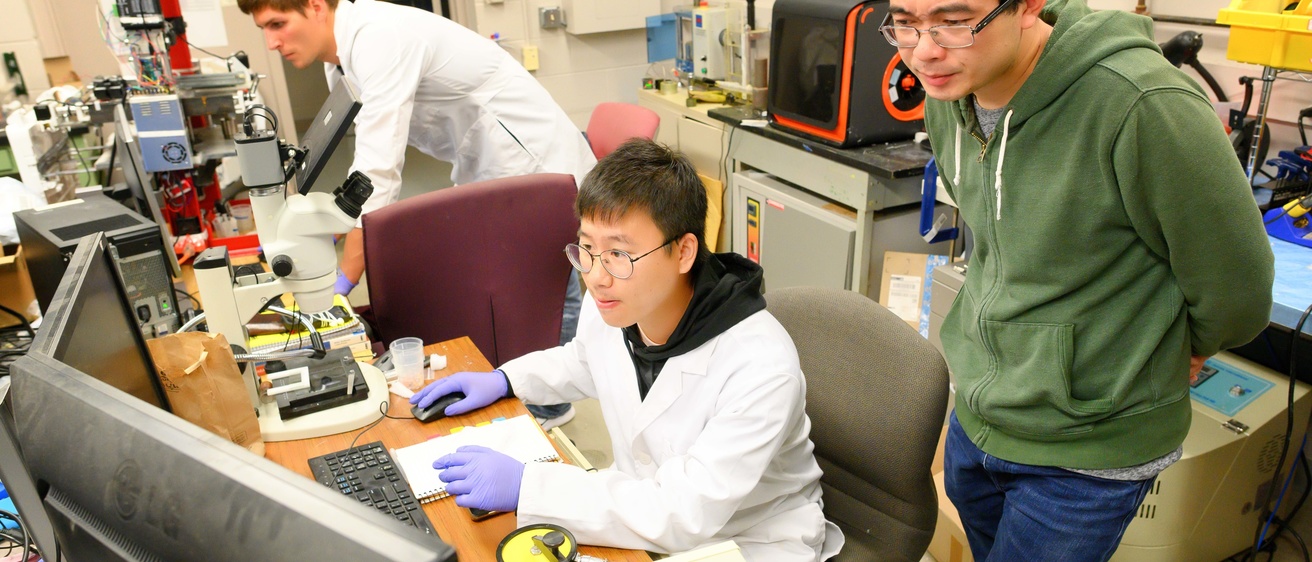 UI professor Xuan Song works on 3d printing of ceramics and polymers at the CCAD Engineering Research Facility.