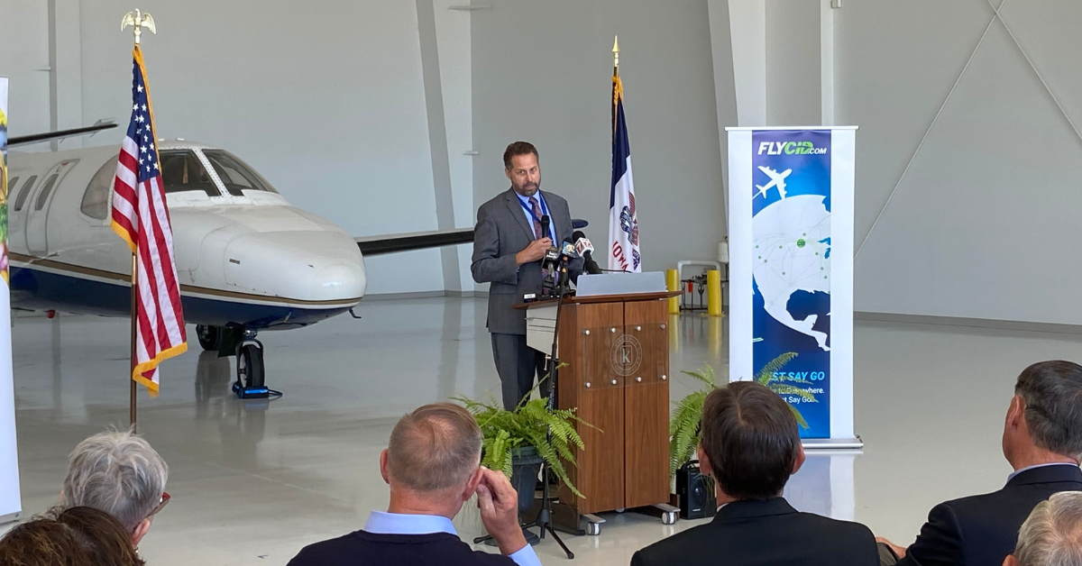 Eastern Iowa Airport Director Marty Lenss speaks to the audience during a federal grant funding announcement for a new Kirkwood aviation program Sept. 28.