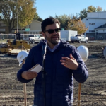 North LIberty Communications Director Nick Bergus addresses the crowd during an Oct. 19 groundbreaking of the new city hall. It is expected to be complete by April 2024.