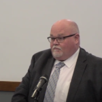 JD Royal Hospitality COO John Crump presents the development plan for a dual-brand hotel concept to Coralville City Council Jan. 24. CREDIT CORALVILLE CITY COUNCIL YOUTUBE