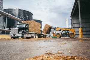 A member of the Verbio Agriculture team delivers stover bales to our plant. These bales were secured from local growers and will be used to create biogas in our RNG production process. CREDIT VERBIO NORTH AMERICA