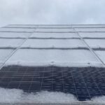 A snow-covered 240 solar panel array alongside the North Liberty Streets Department, installed by Moxie Solar. CREDIT NOAH TONG