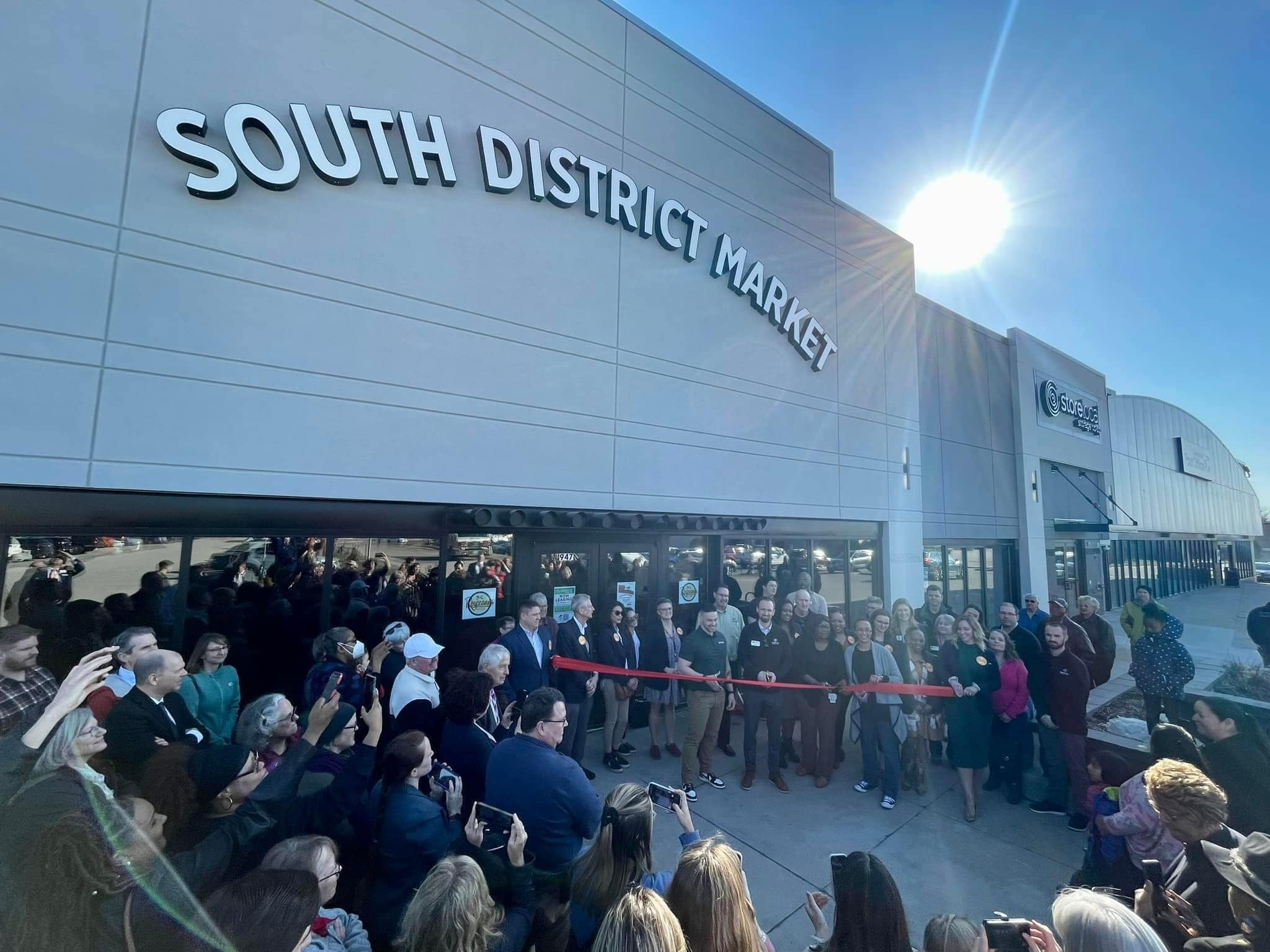 Supporters and organizers at the ribbon cutting for the new South District Market on March 28, 2023. CREDIT SOUTH DISTRICT MARKET