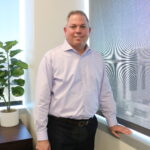 Brian Becker is shown in his office in downtown Cedar Rapids.