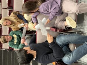 Students at Notre Dame University work in small groups during the budget simulation. CREDIT PHIL SMITH