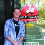 Jon Sewell is a founder of CHOMP Delivery and a franchise owner of Iowa City's DP Dough location. CREDIT CBJ