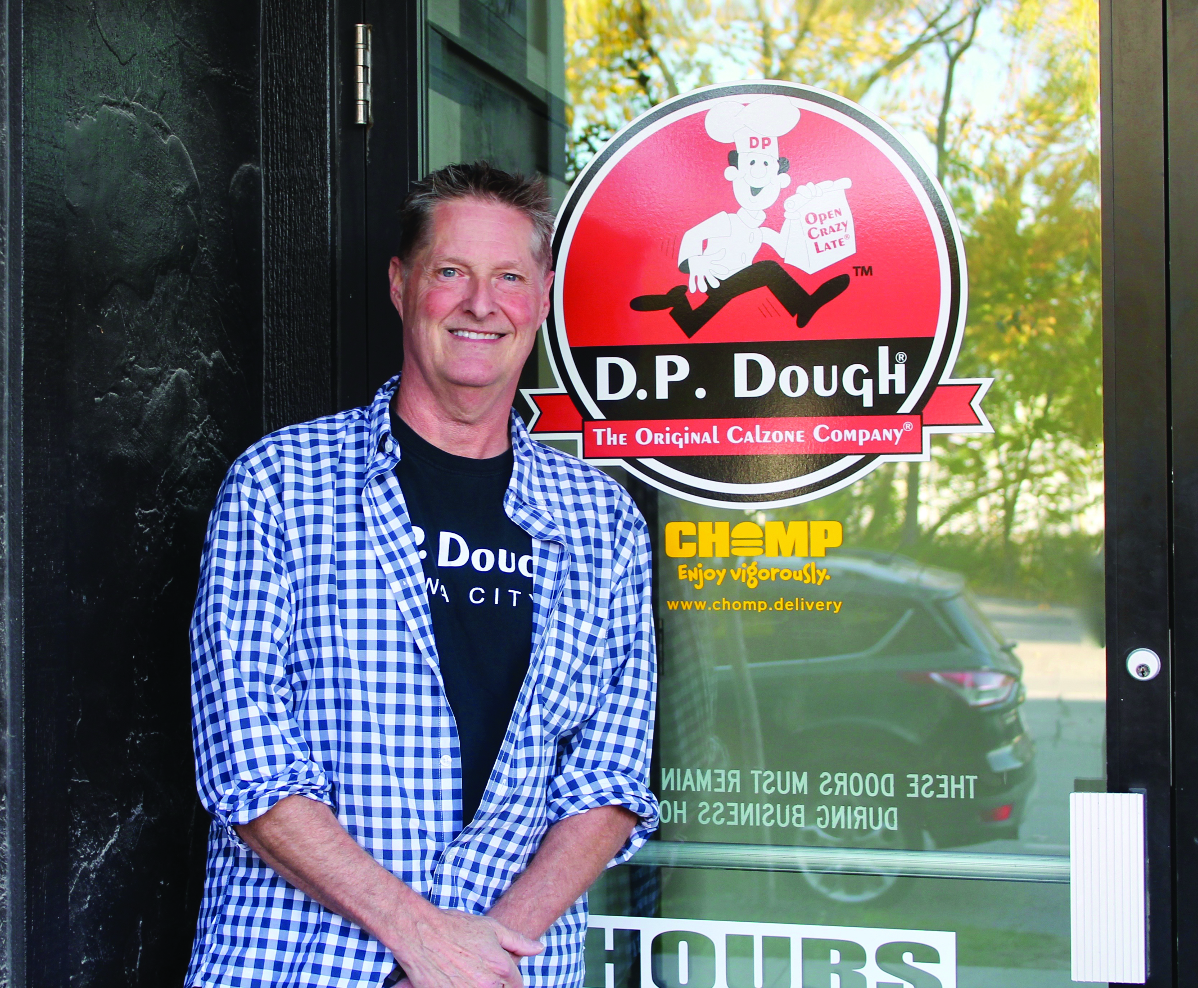 Jon Sewell is a founder of CHOMP Delivery and a franchise owner of Iowa City's DP Dough location. CREDIT CBJ