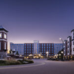 The exterior of Hyatt Regency Coralville Hotel & Conference Center at dusk. CREDIT HYATT REGENCY