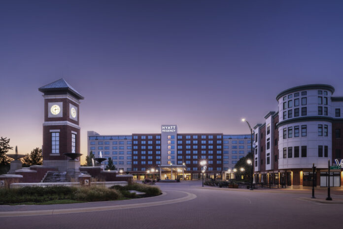 The exterior of Hyatt Regency Coralville Hotel & Conference Center at dusk. CREDIT HYATT REGENCY