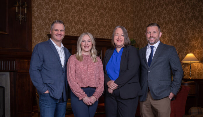 Shea Kelly, Cari McCoy, Jennifer Bennett and Brandon Achen photographed at the Cedar Rapids Country Club by Brian Draeger of Draeger Photography. CEO