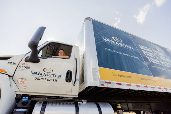 A driver is pictured in a Van Meter truck. CREDIT VAN METER INC.