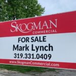 A Skogman Realty commercial real estate sign is seen on West Benton Street in Iowa City on May 16. CREDIT ELEANOR HILDEBRANDT