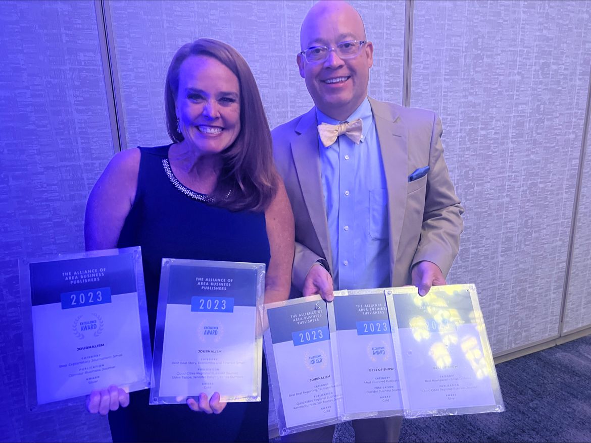 Vice President Aspen Lohman (left) and CEO & President John Lohman (right) display the Corridor Media Group's AABP 2023 Editorial Excellence Awards.