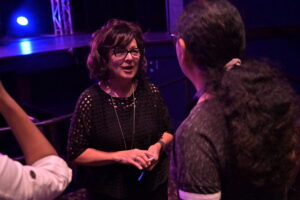 Debi Durham speaks to an audience member following her EntreFEST remarks. CREDIT NEWBOCO