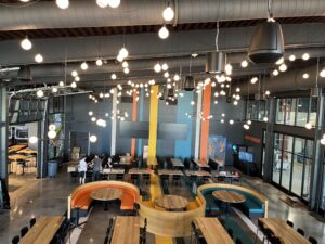 Field Day Brewing has two dining rooms and a mezzanine to accommodate more than400 guests at a time. The space includes three bars, duck bowling, booths and high top seating. PHOTOS BY ELEANOR HILDEBRANDT