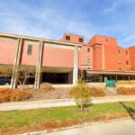 Mercy Hospital-Iowa City. located at 500 E. Market St. in Iowa City, is alleged to be in a “financial freefall.” (Photo via Google Earth)