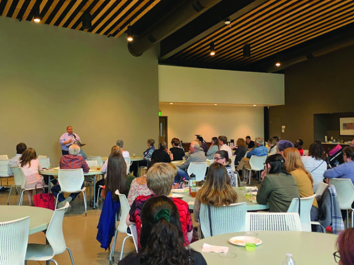 IWN Board Member Horacio Borgen presented to 60 attendees at the IWN’s celebratory kickoff event on June 11. He was a political exile from Nicaragua and immigrated to Iowa two years ago. CREDIT ELEANOR HILDEBRANDT.