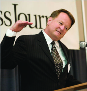 Former Asoyia president, Greg Keeley, accepts an award at the Corridor Business Journal’s Fastest Growing Companies breakfast in 2008. CREDIT CBJ