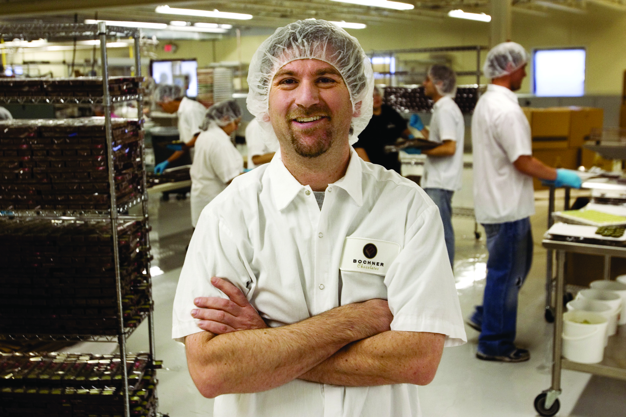 Former Bochner Chocolates president, Eric Bochner, stands in the company’s now closed Iowa City manufacturing center in 2008. CREDIT CBJ