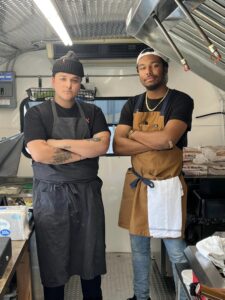 Anthony Leonard (left) and Robert Bolden (right) run the daily operations of FOMO Food Truck. CREDIT FOMO FOOD TRUCK