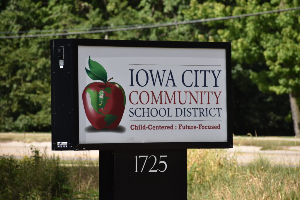 Iowa City Community School District sign by Dodge Street.