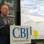 James Leach, factory manager at the John Deere Harvester Works in East Moline, Illinois, delivers a keynote address at the Corridor Business Journal's annual Manufacturing Conference Sept. 15. CREDIT RICHARD PRATT