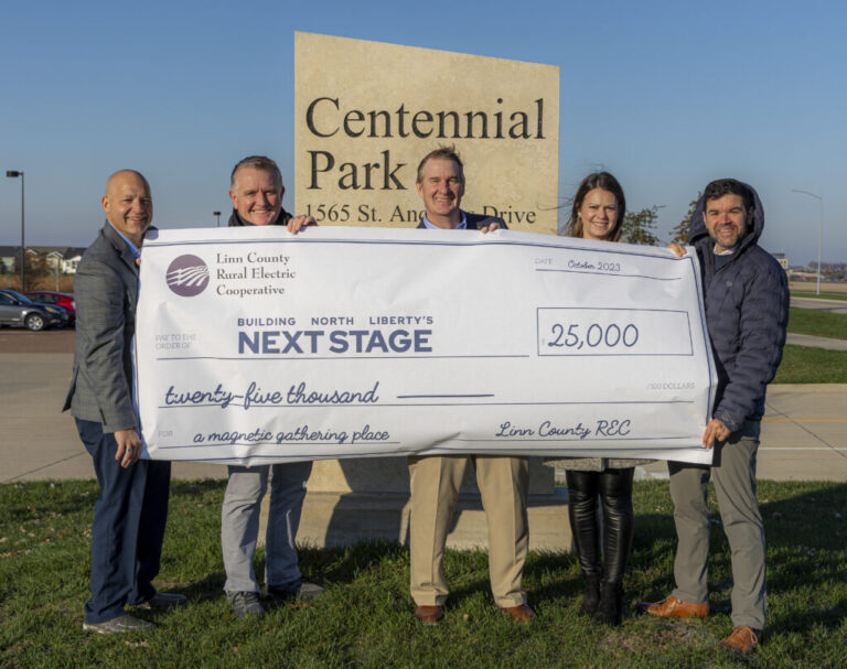 Pictured from left to right: Administrator Ryan Heiar (City), Mayor Chris Hoffman, Terry Sullivan (Linn County REC), Jillian Miller (City) and Nick Bergus (City)