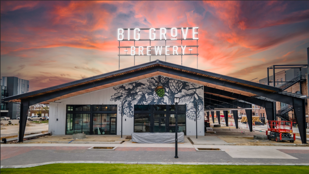 A view of the front entrance of the Big Grove Brewery’s Cedar Rapids taphouse at a recent sunset. CREDIT BIG GROVE
