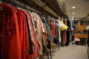 Racks of Found + Formed vintage clothing line the walls of Heim's basement. 