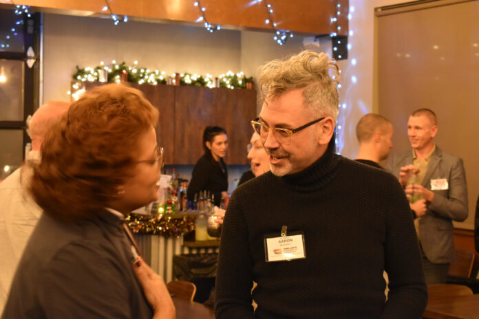 Attendees mix and mingle at the Tin Roost in North Liberty for the Iowa LGBTQ Chamber of Commerce's Cedar Rapids/Iowa City launch.