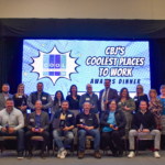 The winners of 2023's Coolest Places to Work pose for a group photo at the awards dinner, Nov. 30, 2023.