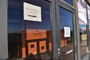 A sign directing deliveries at the entrance of the National Motorcycle Museum. The museum closed in September.