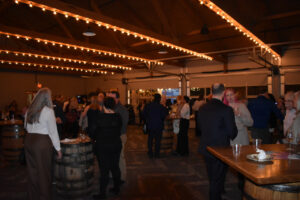 Attendees mingle at the 2024 Legislative Launch at Cedar Ridge Distillery in Swisher. 