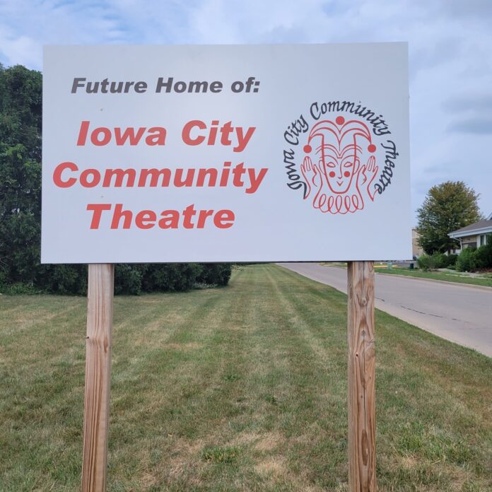 A sign marks the new location of the Iowa City Community Theatre.