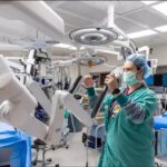 Megan Mulholland, RN, BSN, prepares an Operating Room and robot for a Robotic Prostatectomy at University of Iowa Hospitals and Clinics.