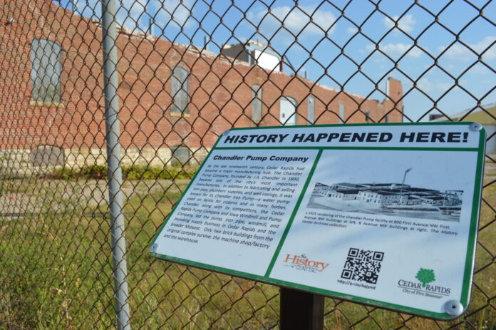 A sign marks the history of the Chandler Pump Co., in Cedar Rapids, Iowa. (photo/Cindy Hadish)