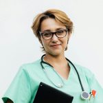 Nursing Photo by Karolina Grabowska